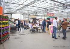 People enjoying a drink or a snack at Dummen Orange.